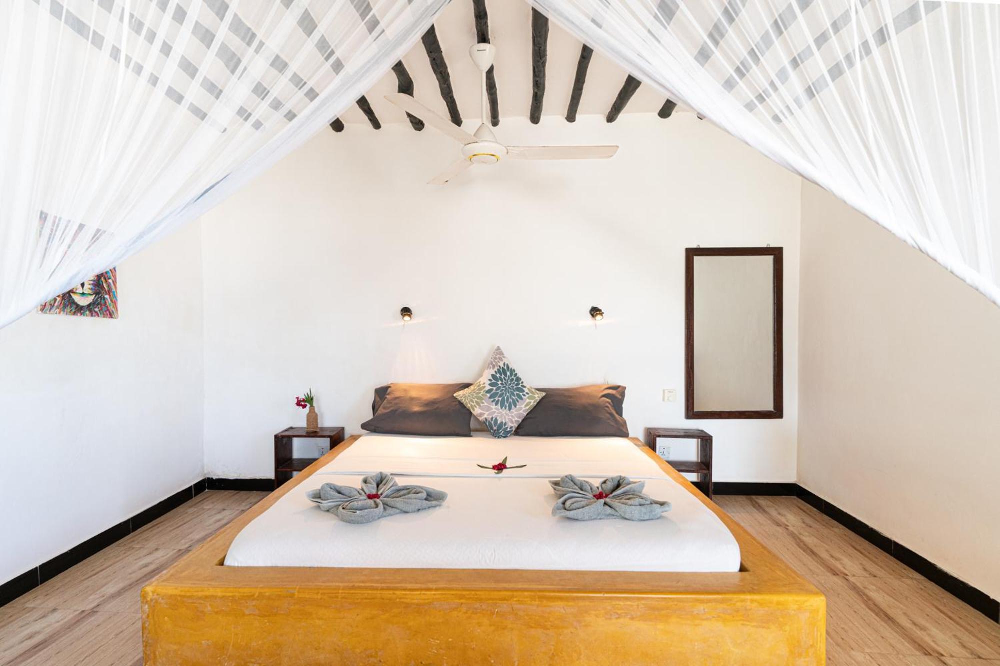 גאמביאני Red Monkey Beach Lodge מראה חיצוני תמונה
